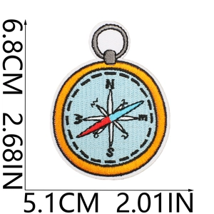 Detailed view of an embroidered compass patch with size dimensions and stitch texture