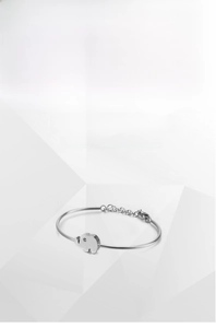 Close-up of elephant pendant bracelet in polished 316L stainless steel with crystal detail