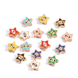 Colorful star-shaped Evil Eye alloy charms for jewelry making on a clean white background
