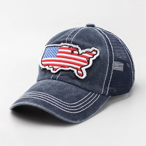 Detail of vintage navy blue trucker hat with American map embroidery and white stitching