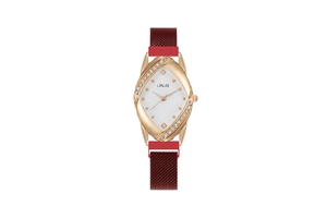 Detailed macro of rose gold rhombus watch case with crystal inlay and burgundy mesh strap