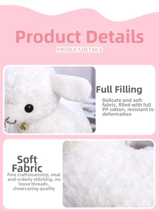 Detail view of curly white plush sheep with premium PP cotton filling and golden bell