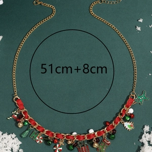 Christmas necklace with festive gingerbread man and bell charms on red woven gold chain
