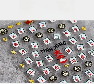 Detailed 5D relief nail stickers featuring Mahjong tiles and Chinese New Year motifs