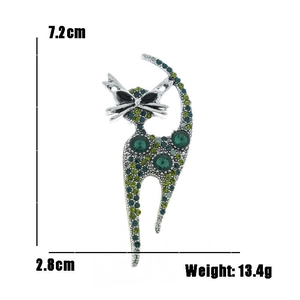 Vintage green crystal cat brooch in silver metal with 7.2cm x 2.8cm size details