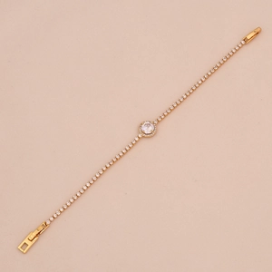 Elegant 18K gold-plated tennis bracelet featuring a round zircon heart pendant for women