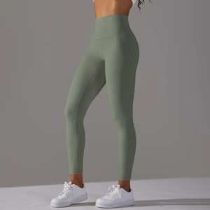 Side view of high-waisted seamless sage green yoga leggings with lifting effect