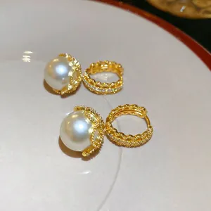 Gold plated pearl drop earrings with zircon crown and hollow wave lace detail