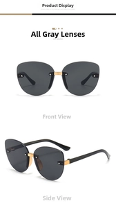 Close-up of stylish oversized gradient sunglasses with sleek black temples and gold accents