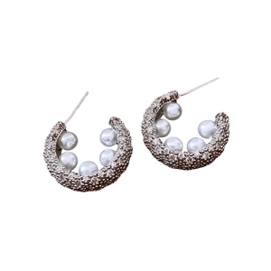 French C-shape stud earrings with silver needles, white pearls and sparkling zircons