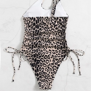One-piece leopard print swimsuit with single shoulder strap and side drawstring details