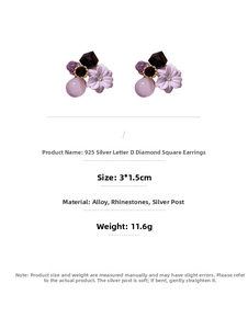 Detailed view of floral cluster earrings with purple crystals and 925 silver needles