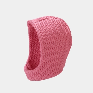 Detailed texture of pink quilted winter balaclava with warm windproof padded design