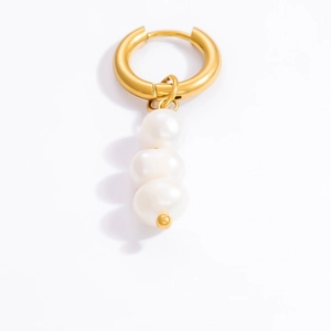 Detail of 18k gold stainless steel earring with three natural freshwater pearl pendants
