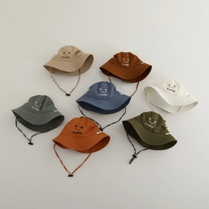 Breathable cotton children's bucket hats with smiley face embroidery and adjustable straps
