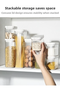 Detail of stackable airtight food containers with recessed lids for space-saving kitchen storage