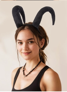 Detail view of the plush textured black demon horns headband for Halloween cosplay