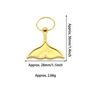 Detailed view of gold mermaid tail pendant with 36mm height and 28mm width dimensions