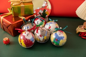 Christmas socks in transparent gift ball packaging with festive ribbons and embroidery