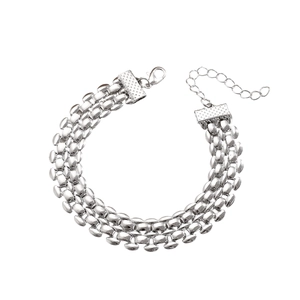 Detail of silver multi-row chain bracelet featuring pebble links and lobster clasp