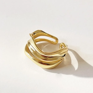 Minimalist wavy 925 sterling silver ring in gold finish with layered open design