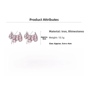 Macro shot showing dimensions of two pink rhinestone dog hair clips with shiny crystals