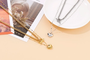 Close-up of double-layer titanium steel necklace with heart pendant and OT toggle clasp