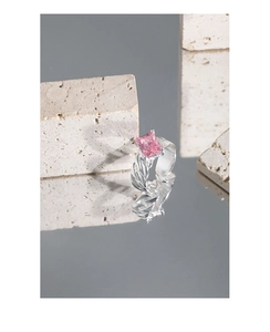 Detail of S925 silver ring featuring a large rectangular pink gemstone in claw setting