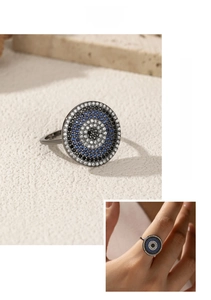 Macro shot of S925 sterling silver evil eye ring with blue and white zircon pave setting
