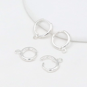 Set of four polished silver round leverback earring hoops with small hanging loops