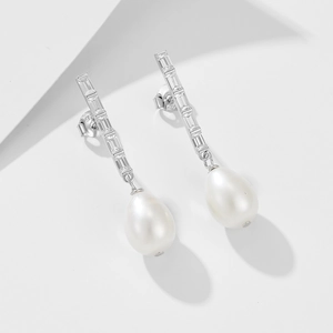 Detail showing high-quality freshwater pearl earrings with S925 silver and cubic zirconia