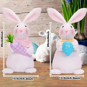 Set of two Easter bunny plush figurines with carrot and egg motifs for holiday decor