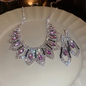 Luxury geometric necklace and earring set with purple marquise gems and rhinestones