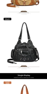 Detail of vintage washed PU leather bag with multiple zippers and decorative metal buckles