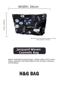 Detail of floral embroidery linen makeup bag showing 26cm width and canvas lining