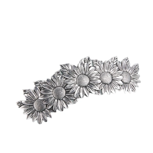 Retro silver metal hair clip with five detailed sunflower designs on a curved spring bar