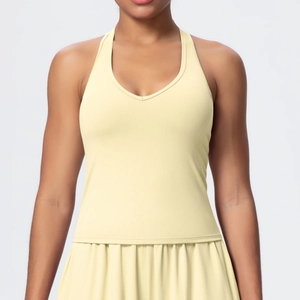 Detailed view of women's pale yellow V-neck sports tank top with ribbed texture