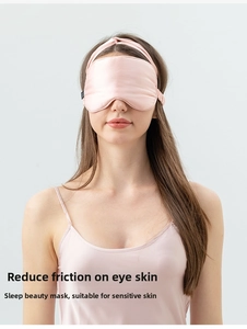 Pink silk sleep mask and matching headband set shown on model for eye skin protection