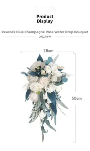 Detail of 26cm x 50cm cascading bridal bouquet with champagne roses and blue berries