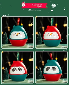 Detail of Christmas snowman and panda gift boxes with festive ribbons and 3D shapes