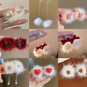 Winter plush earrings collection with pearls, hearts and red fur balls in nine styles