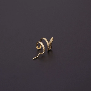 Punk style golden snake ear cuff with detailed scale texture and wrap-around design