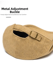 Close-up of the metal adjustment buckle on this beige tweed flat cap for a custom fit