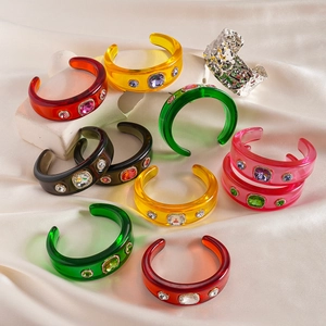 Retro colorful resin open bangle featuring sparkling crystals and a geometric design