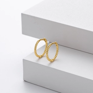 Minimalist 925 sterling silver twisted hoop earrings with elegant golden plated finish