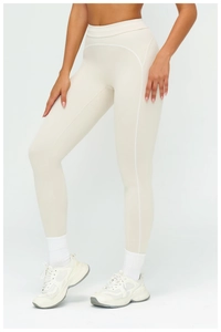 Close-up of high-waist yoga pants with white decorative seams and stretch fabric