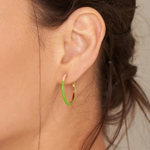 S925 silver green enamel hoop earrings with zircons shown on a model for a chic look