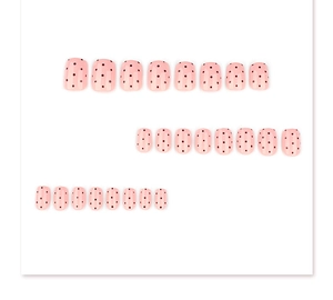 Detail of short square press-on nails with pink base, black polka dots and thin stripes