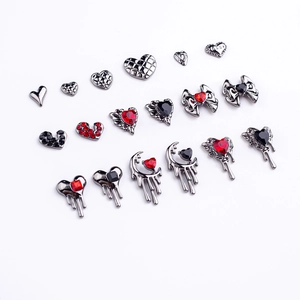 Gothic nail art charms set with dark hearts, crosses, and moons in black alloy finish