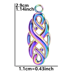 Macro shot of iridescent witch knot charm with precise dimensions of 2.9cm by 1.1cm